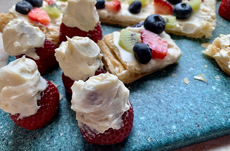 Photo of maple cream cheese topped strawberries