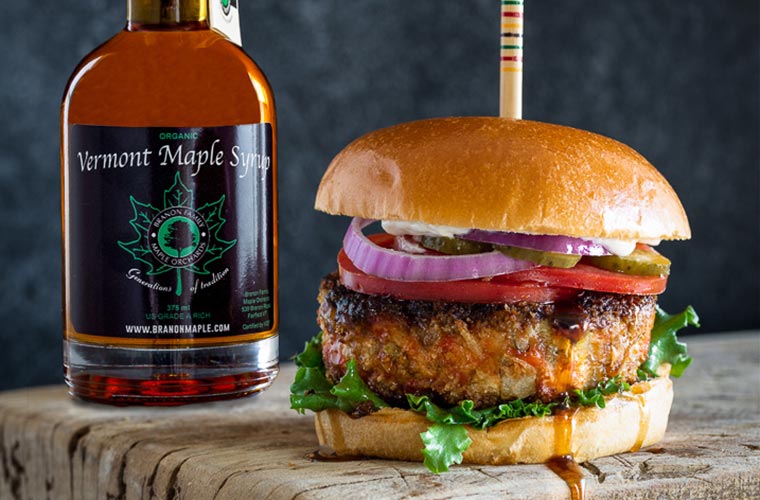 Photo of Branon maple syrup and a salmon burger