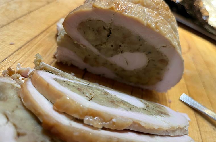 Photo of sliced stuffed Vermont turkey breasts with pure maple glaze